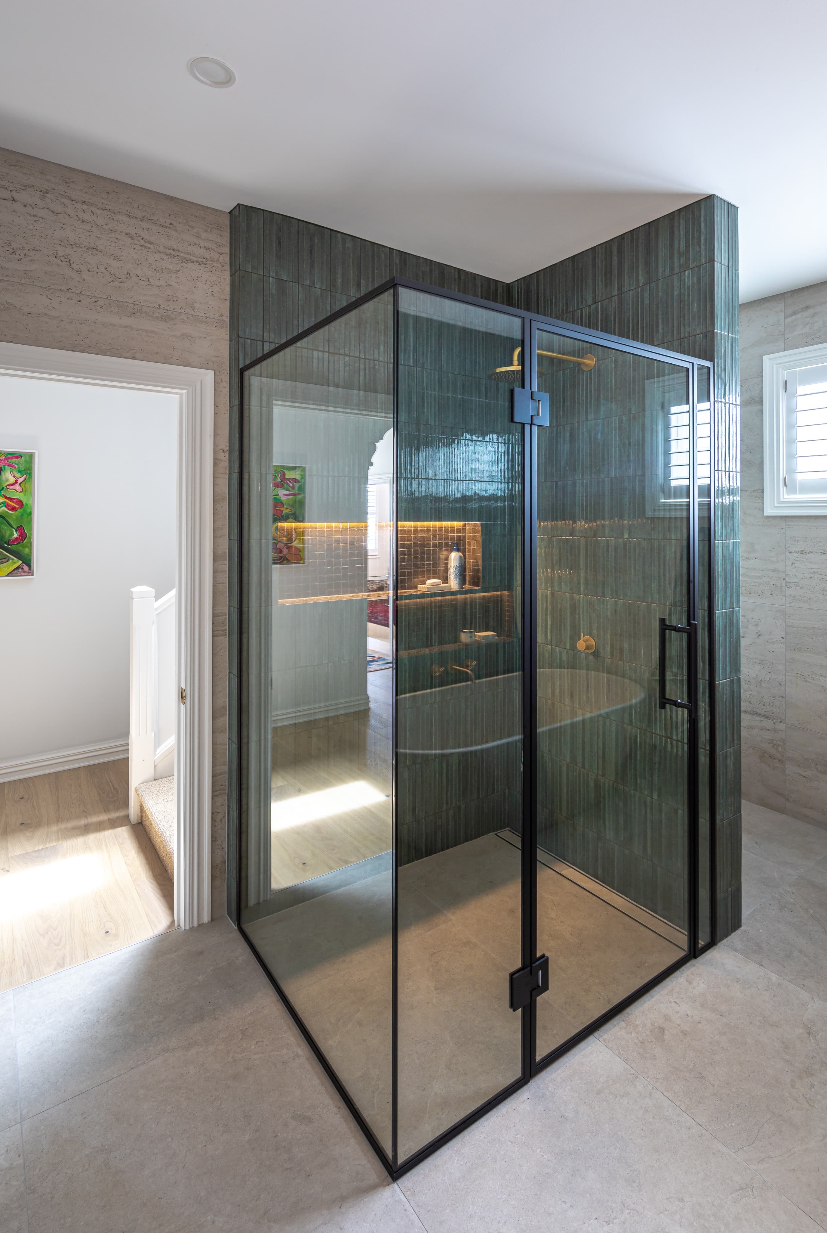 Contemporary bathroom with wall-mounted fixtures