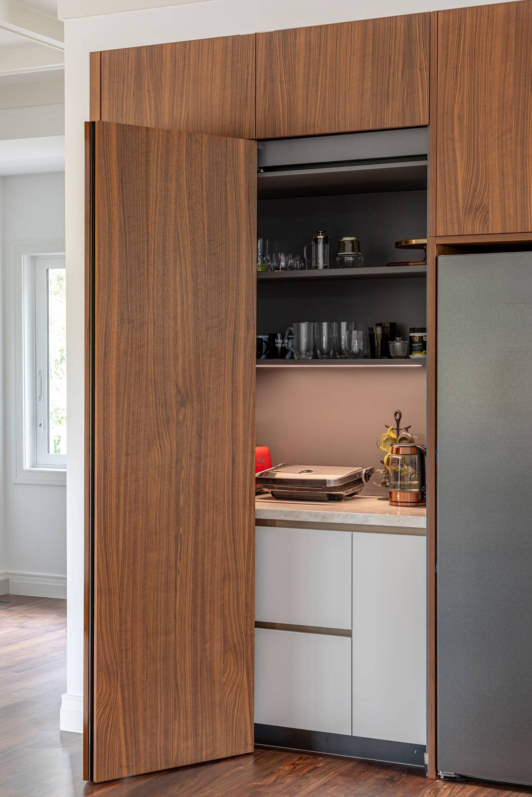 Pocket slider doors fully open revealing the hidden workspace
