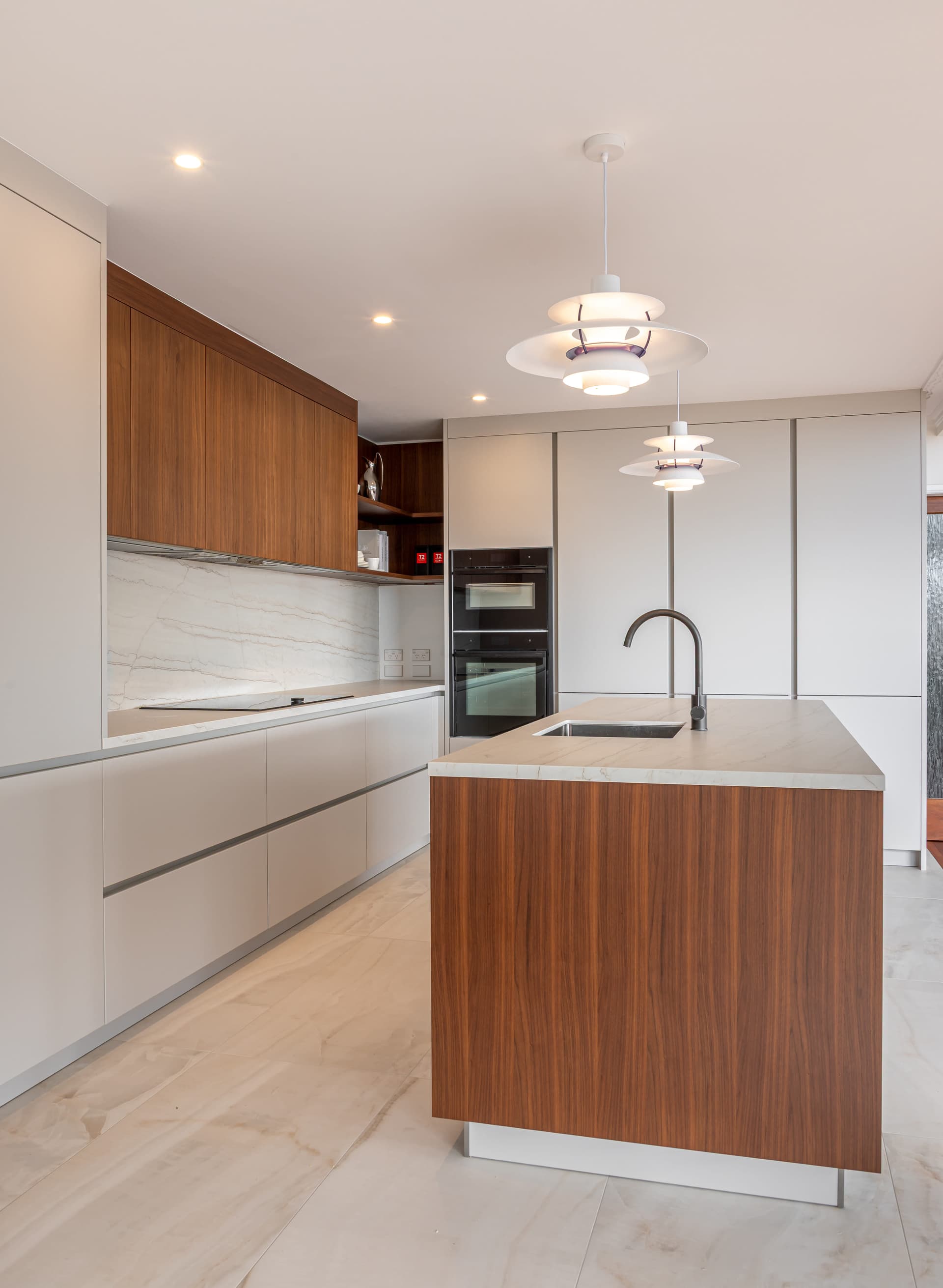 Island facing the tall cabinets