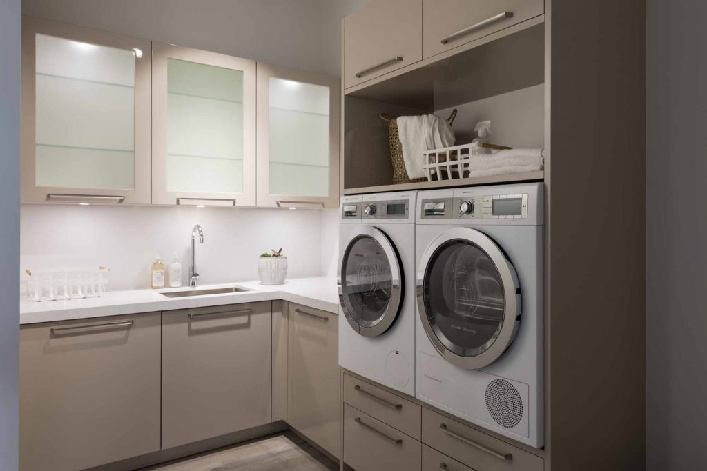 Newly built laundry room highlighting supplementary areas as a kitchen design trend in 2023