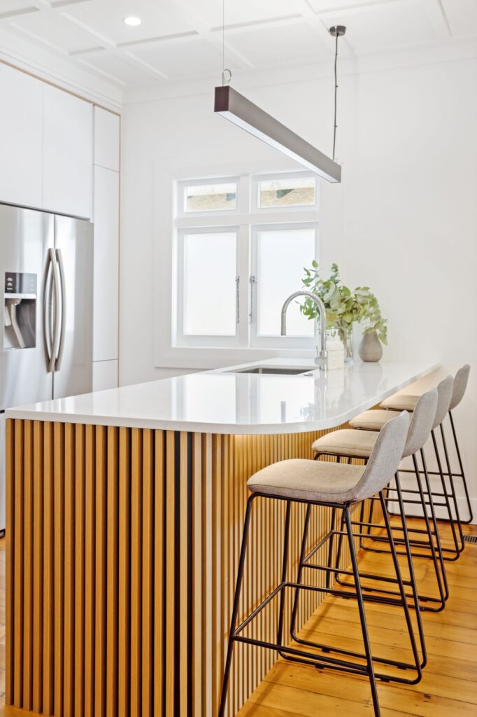 Newly built kitchen highlighting muted countertops as a kitchen design trend in 2023